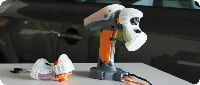 GapGun Pro in docking station demonstrating VChange mechanism